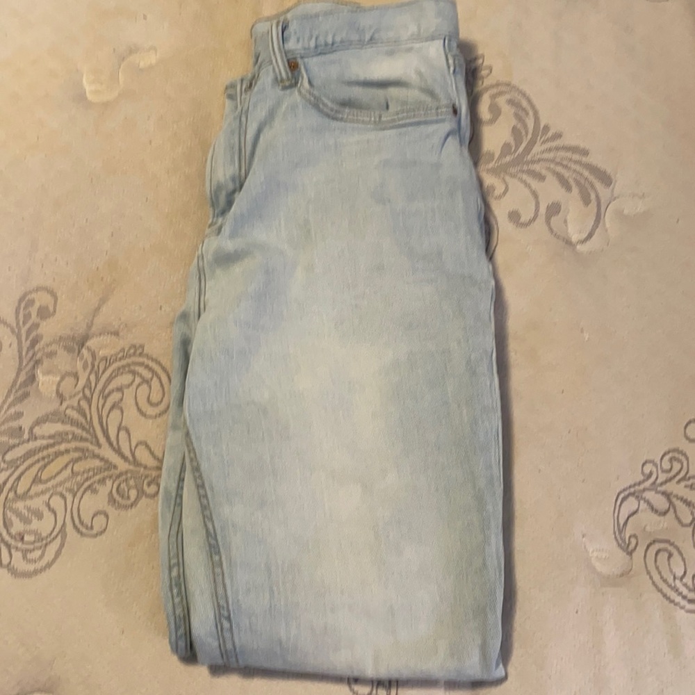 Light wash jeans, 32W (runs large - closer to 34W)